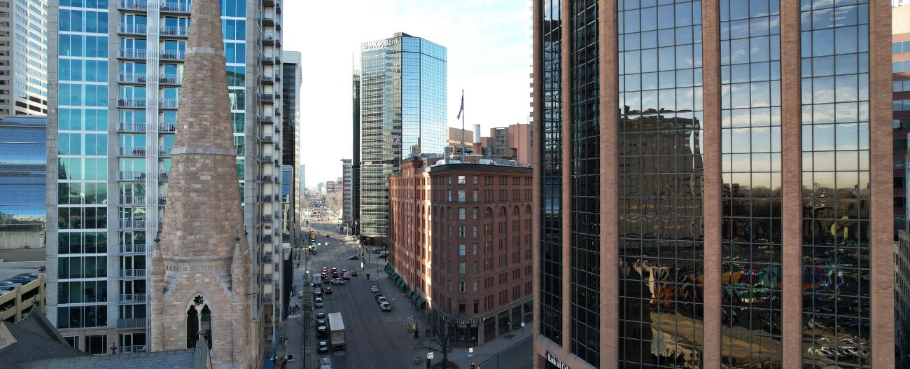 Drone capture of a street & commercial buildings in Downtown Denver
